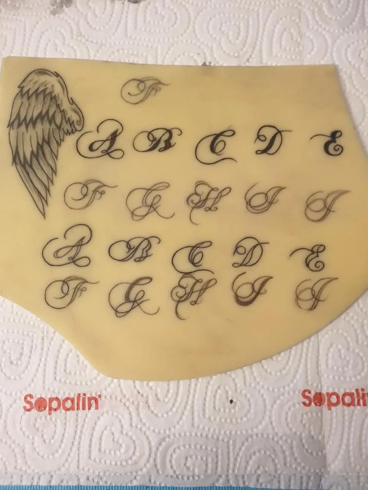 TP élève — alphabet calligraphié et aile d'ange