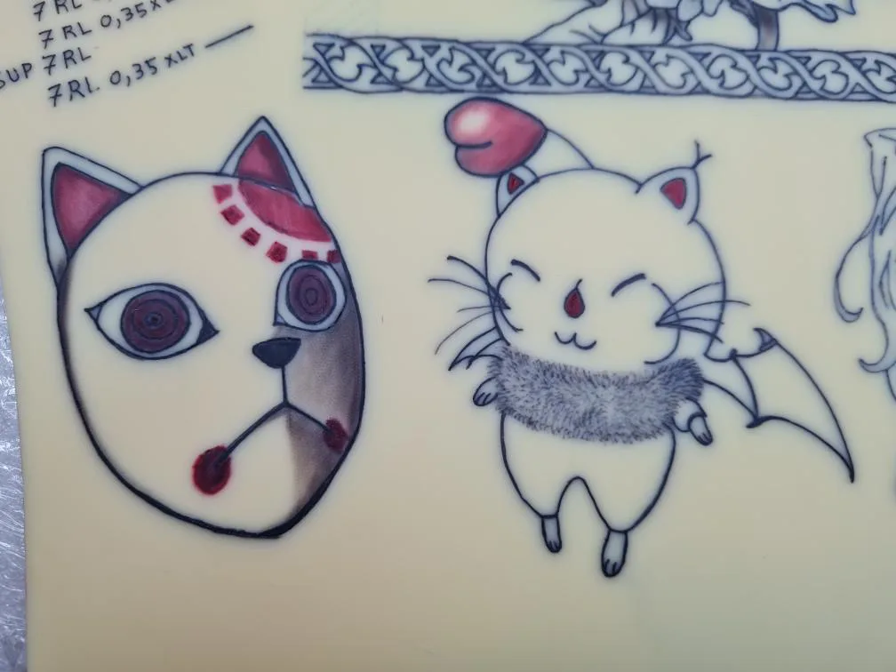 TP élève — masque de chat japonais et chaton ailé